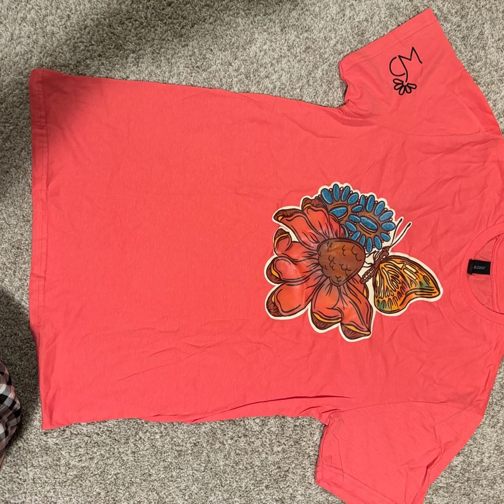 Vibrant Coral T-Shirt with Floral and Butterfly Design